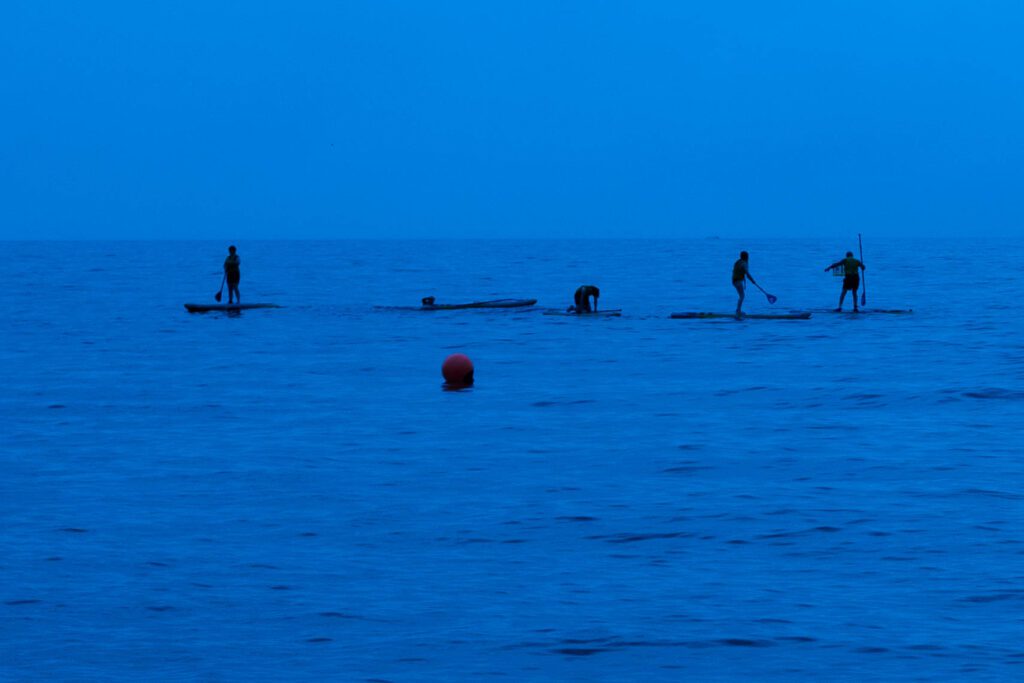 Paddle Boarders off Gyllngvase Beach