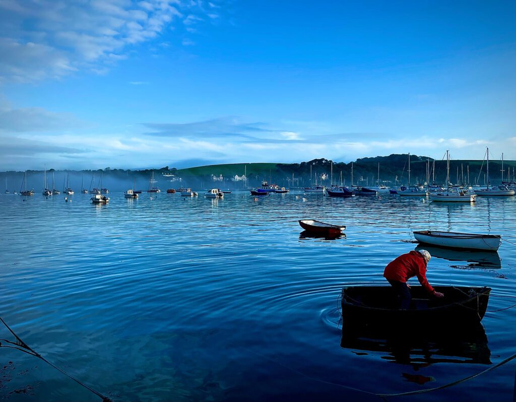 A boat person gets comfy in Falmouth Harbour