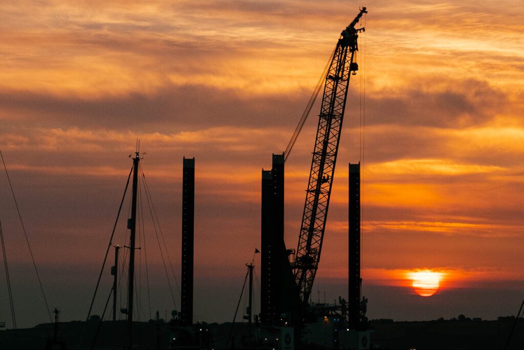 An old crane of Falmouth Docks welcomes the dawn